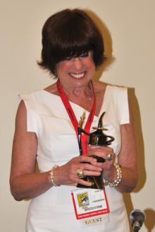 Jenette Kahn with her Inkpot Award (2010)